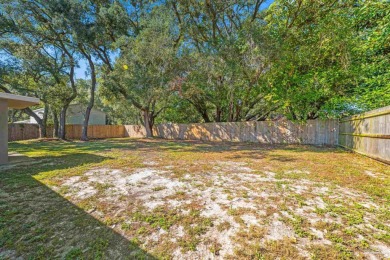 Discover an incredible opportunity to own a 4-bedroom brick home on Tiger Point Golf and Country Club in Florida - for sale on GolfHomes.com, golf home, golf lot