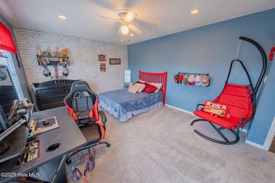 Welcome to this beautifully updated 6-bedroom, 2.5-bath home on Eagle Creek Golf Club and Grill in North Carolina - for sale on GolfHomes.com, golf home, golf lot