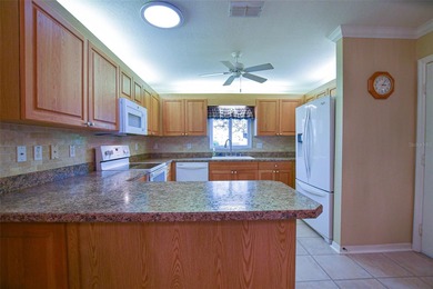 Welcome to your new beginning.  Well maintained home, close to on Eagle Ridge At Spruce Creek Country Club in Florida - for sale on GolfHomes.com, golf home, golf lot