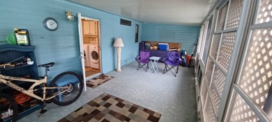 Come settle down and relax in a beautiful manufactured home with on Fairways Country Club in Florida - for sale on GolfHomes.com, golf home, golf lot