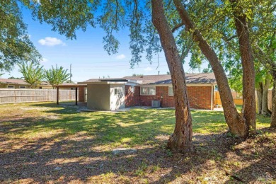Discover an incredible opportunity to own a 4-bedroom brick home on Tiger Point Golf and Country Club in Florida - for sale on GolfHomes.com, golf home, golf lot