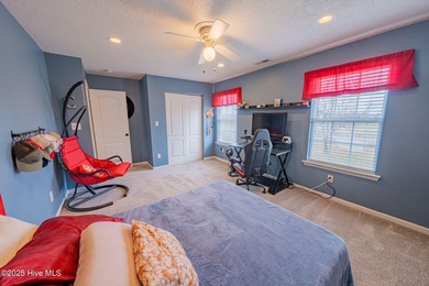 Welcome to this beautifully updated 6-bedroom, 2.5-bath home on Eagle Creek Golf Club and Grill in North Carolina - for sale on GolfHomes.com, golf home, golf lot