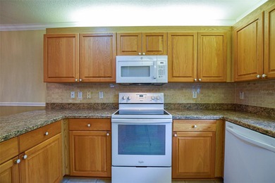 Welcome to your new beginning.  Well maintained home, close to on Eagle Ridge At Spruce Creek Country Club in Florida - for sale on GolfHomes.com, golf home, golf lot