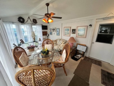 Beautiful stucco home on the exterior perimeter.  Updated on Del Tura Golf and Country Club in Florida - for sale on GolfHomes.com, golf home, golf lot