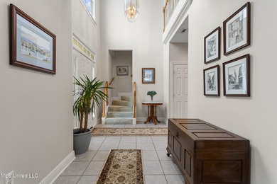 After 30 years of single family ownership, this 2,486 SF home is on Pass Christian Isles Golf Club in Mississippi - for sale on GolfHomes.com, golf home, golf lot