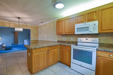 Welcome to your new beginning.  Well maintained home, close to on Eagle Ridge At Spruce Creek Country Club in Florida - for sale on GolfHomes.com, golf home, golf lot