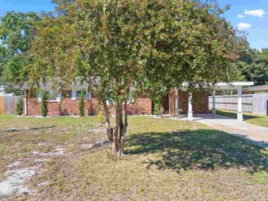 Discover an incredible opportunity to own a 4-bedroom brick home on Tiger Point Golf and Country Club in Florida - for sale on GolfHomes.com, golf home, golf lot