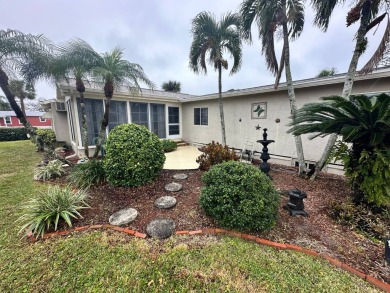 Beautiful stucco home on the exterior perimeter.  Updated on Del Tura Golf and Country Club in Florida - for sale on GolfHomes.com, golf home, golf lot