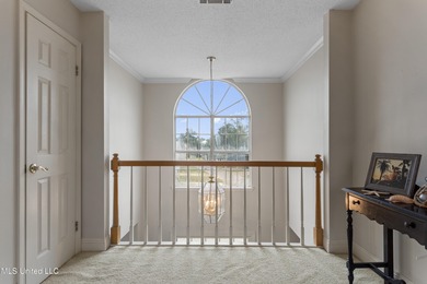 After 30 years of single family ownership, this 2,486 SF home is on Pass Christian Isles Golf Club in Mississippi - for sale on GolfHomes.com, golf home, golf lot