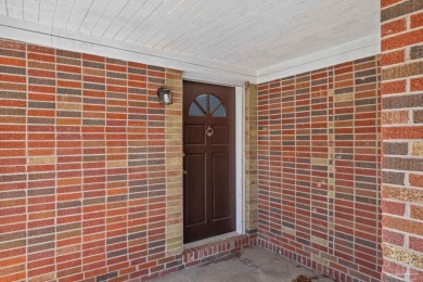 Discover an incredible opportunity to own a 4-bedroom brick home on Tiger Point Golf and Country Club in Florida - for sale on GolfHomes.com, golf home, golf lot