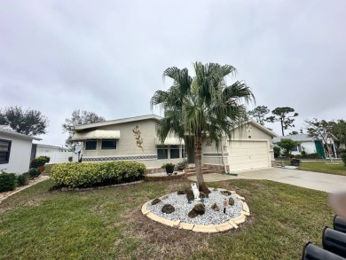 Beautiful stucco home on the exterior perimeter.  Updated on Del Tura Golf and Country Club in Florida - for sale on GolfHomes.com, golf home, golf lot