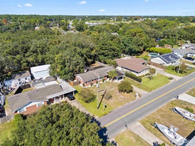 Discover an incredible opportunity to own a 4-bedroom brick home on Tiger Point Golf and Country Club in Florida - for sale on GolfHomes.com, golf home, golf lot
