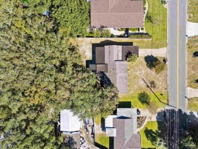 Discover an incredible opportunity to own a 4-bedroom brick home on Tiger Point Golf and Country Club in Florida - for sale on GolfHomes.com, golf home, golf lot