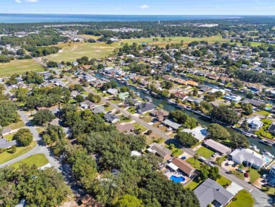Discover an incredible opportunity to own a 4-bedroom brick home on Tiger Point Golf and Country Club in Florida - for sale on GolfHomes.com, golf home, golf lot