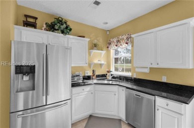 Beautifully maintained villa offering serene golf course views on Hidden Cypress Golf Club in South Carolina - for sale on GolfHomes.com, golf home, golf lot