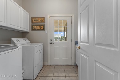 After 30 years of single family ownership, this 2,486 SF home is on Pass Christian Isles Golf Club in Mississippi - for sale on GolfHomes.com, golf home, golf lot