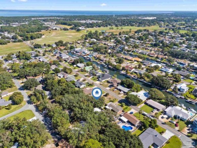 Discover an incredible opportunity to own a 4-bedroom brick home on Tiger Point Golf and Country Club in Florida - for sale on GolfHomes.com, golf home, golf lot