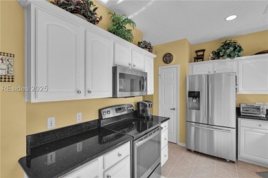 Beautifully maintained villa offering serene golf course views on Hidden Cypress Golf Club in South Carolina - for sale on GolfHomes.com, golf home, golf lot