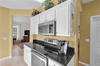 Beautifully maintained villa offering serene golf course views on Hidden Cypress Golf Club in South Carolina - for sale on GolfHomes.com, golf home, golf lot