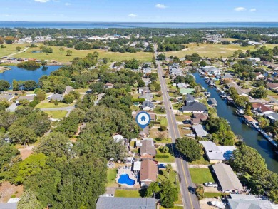 Discover an incredible opportunity to own a 4-bedroom brick home on Tiger Point Golf and Country Club in Florida - for sale on GolfHomes.com, golf home, golf lot