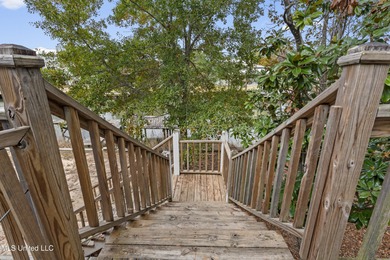 After 30 years of single family ownership, this 2,486 SF home is on Pass Christian Isles Golf Club in Mississippi - for sale on GolfHomes.com, golf home, golf lot