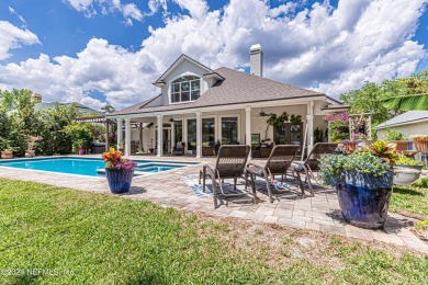 This stunning POOL HOME overlooking the second green of the on Eagle Harbor Golf Club in Florida - for sale on GolfHomes.com, golf home, golf lot