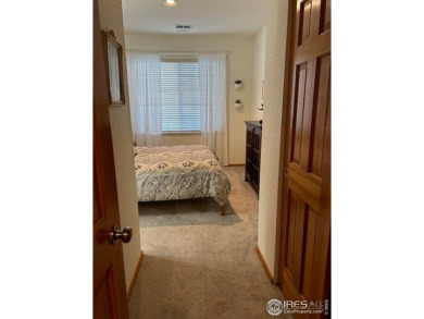 Check out this spacious & sunny end unit w/golf course views! It on The Broadlands Golf Course in Colorado - for sale on GolfHomes.com, golf home, golf lot