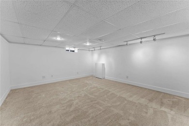 Charming and well-maintained 3-bed, 2-bath home on a spacious on Soldiers Memorial Field Golf Course in Minnesota - for sale on GolfHomes.com, golf home, golf lot