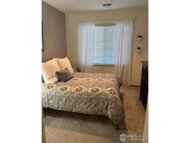 Check out this spacious & sunny end unit w/golf course views! It on The Broadlands Golf Course in Colorado - for sale on GolfHomes.com, golf home, golf lot