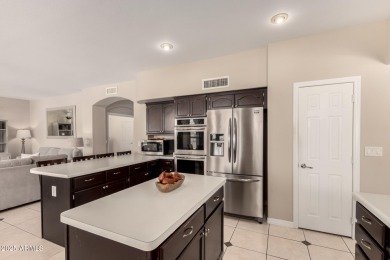 Your DREAM home is perfectly nestled on a premium golf course on The Foothills Golf Club in Arizona - for sale on GolfHomes.com, golf home, golf lot