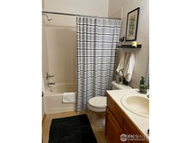 Check out this spacious & sunny end unit w/golf course views! It on The Broadlands Golf Course in Colorado - for sale on GolfHomes.com, golf home, golf lot