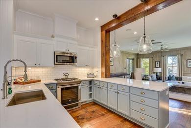 Welcome to the Blair Cottage. This remarkable 8-bedroom on Champions Retreat Golf Club in Georgia - for sale on GolfHomes.com, golf home, golf lot