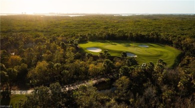 This rare two bedroom, two bath residence, boasts an expansive on West Bay Beach and Golf Club in Florida - for sale on GolfHomes.com, golf home, golf lot