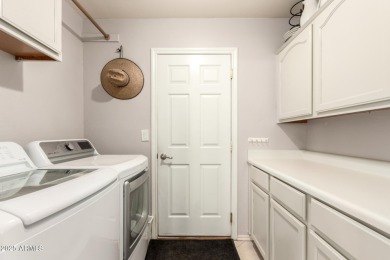 Your DREAM home is perfectly nestled on a premium golf course on The Foothills Golf Club in Arizona - for sale on GolfHomes.com, golf home, golf lot