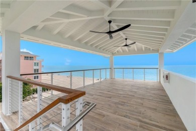 This rare two bedroom, two bath residence, boasts an expansive on West Bay Beach and Golf Club in Florida - for sale on GolfHomes.com, golf home, golf lot