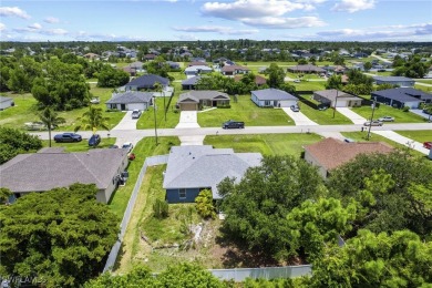Located in NE Cape, this 3 bedroom, 2 bathroom home offers a on Del Tura Golf and Country Club in Florida - for sale on GolfHomes.com, golf home, golf lot