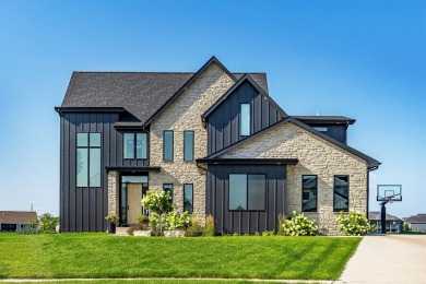 Located on Otter Creek Golf Course in a quiet cul-de-sac, this on Otter Creek Golf Course in Iowa - for sale on GolfHomes.com, golf home, golf lot