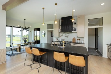 Located on Otter Creek Golf Course in a quiet cul-de-sac, this on Otter Creek Golf Course in Iowa - for sale on GolfHomes.com, golf home, golf lot