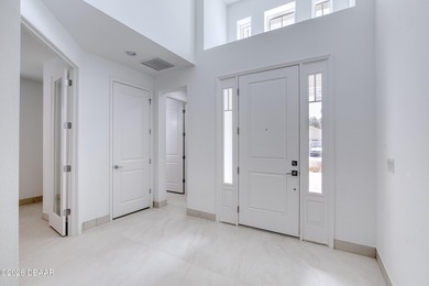 Presenting the highly sought-after Trinidad Bay, the largest on LPGA International Golf Course in Florida - for sale on GolfHomes.com, golf home, golf lot