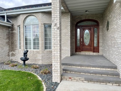 Welcome to your luxurious ranch-style oasis at the Country Club! on Fort Dodge Country Club in Iowa - for sale on GolfHomes.com, golf home, golf lot