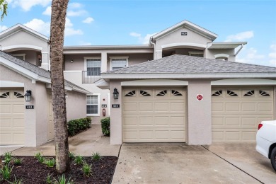 Nestled in the heart of Lake Nona, this quaint 2-bedroom on North Shore Golf Club in Florida - for sale on GolfHomes.com, golf home, golf lot