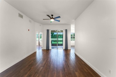 Nestled in the heart of Lake Nona, this quaint 2-bedroom on North Shore Golf Club in Florida - for sale on GolfHomes.com, golf home, golf lot