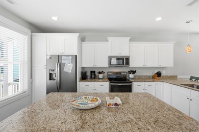 Sand Tiger is your complete beach retreat located in Surfside on Tupelo Bay Golf Complex  in South Carolina - for sale on GolfHomes.com, golf home, golf lot