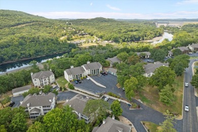 Discover lakeside luxury at its finest! This completely on Pointe Royale Village Country Club in Missouri - for sale on GolfHomes.com, golf home, golf lot