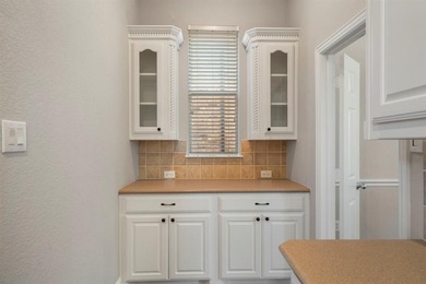 Experience resort style living in the exclusive gated community on Heritage Lakes - Par 3 - 9 Hole Course in Texas - for sale on GolfHomes.com, golf home, golf lot