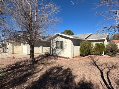 3 bedroom, 2 bath stucco home with attached 2-car garage on a on Valle Vista Golf Course in Arizona - for sale on GolfHomes.com, golf home, golf lot