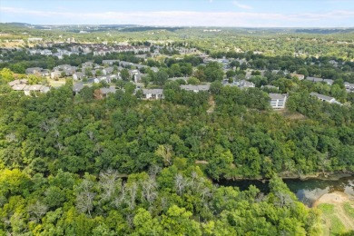 Discover lakeside luxury at its finest! This completely on Pointe Royale Village Country Club in Missouri - for sale on GolfHomes.com, golf home, golf lot
