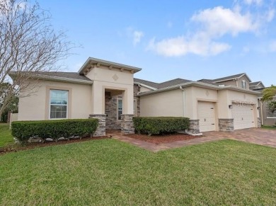 This sophisticated 4-bedroom, 2-bathroom home offers an on Forest Lake Golf Club in Florida - for sale on GolfHomes.com, golf home, golf lot