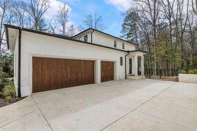 Stunning new construction tucked at the end of a cul-de-sac in on North Fulton Golf Course in Georgia - for sale on GolfHomes.com, golf home, golf lot