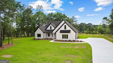 NEW CONSTRUCTION - MOVE IN READY! Welcome to newly built on Raintree Country Club in Georgia - for sale on GolfHomes.com, golf home, golf lot